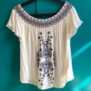 Ivory peasant blouse with navy embroidery